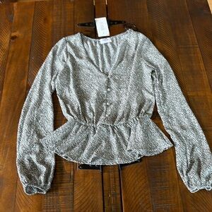 NWT. Sienna Sky XS top. Black and off white. New condition. See photos
